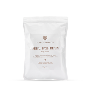 Front view of the Moroccan Bloom Herbal Bath Ritual packaging, a white resealable pouch containing a 100g natural botanical tea bag for bath soaking.